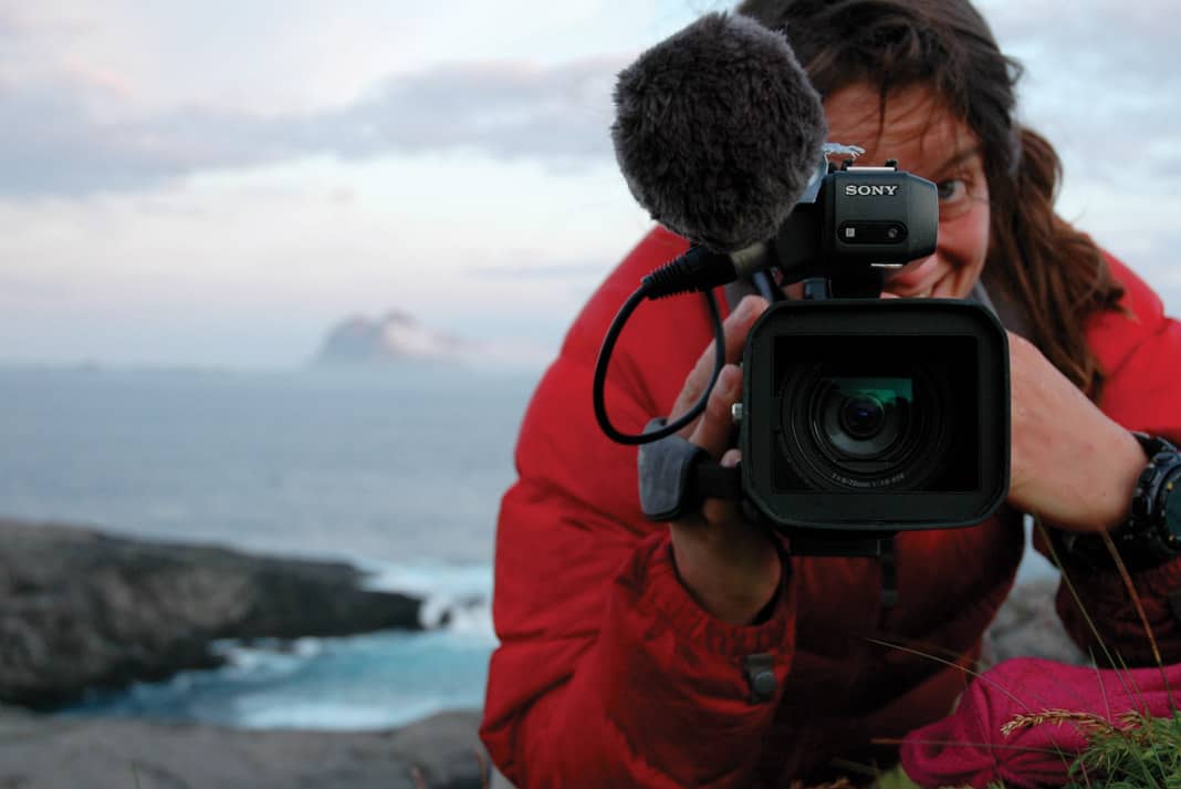 Justine Curgenven filming a whitewater kayaking movie