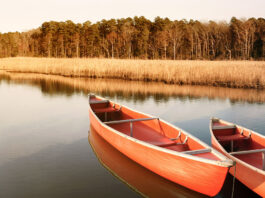 Two red plastic canoes