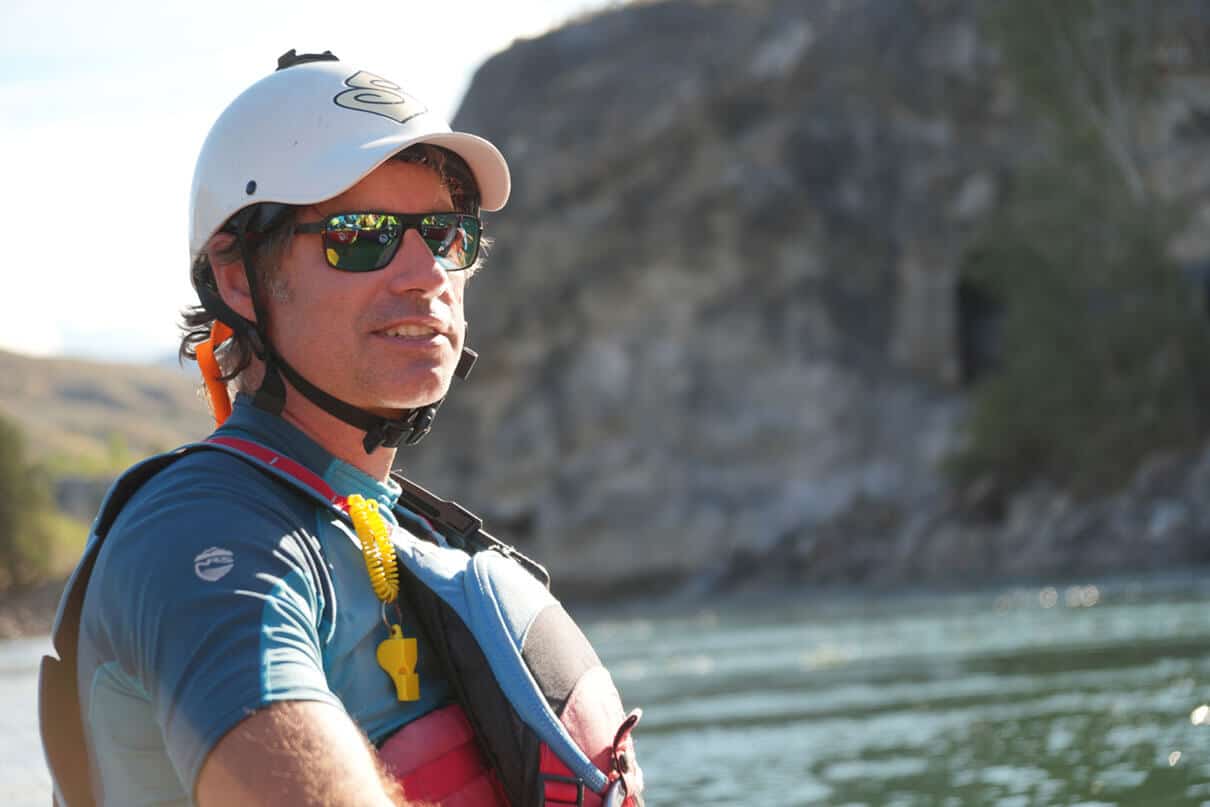 portrait photo of Charles Ruechel, owner of Elements Adventure Company, at riverside
