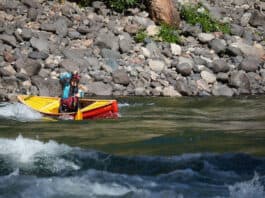Elements Adventure Company guide and instructor Emily Cole doing what the Ocoee does best—precision paddling