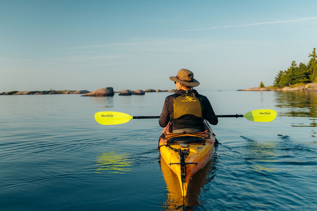 Kayaker with a low-angle paddle on Georgian Bay