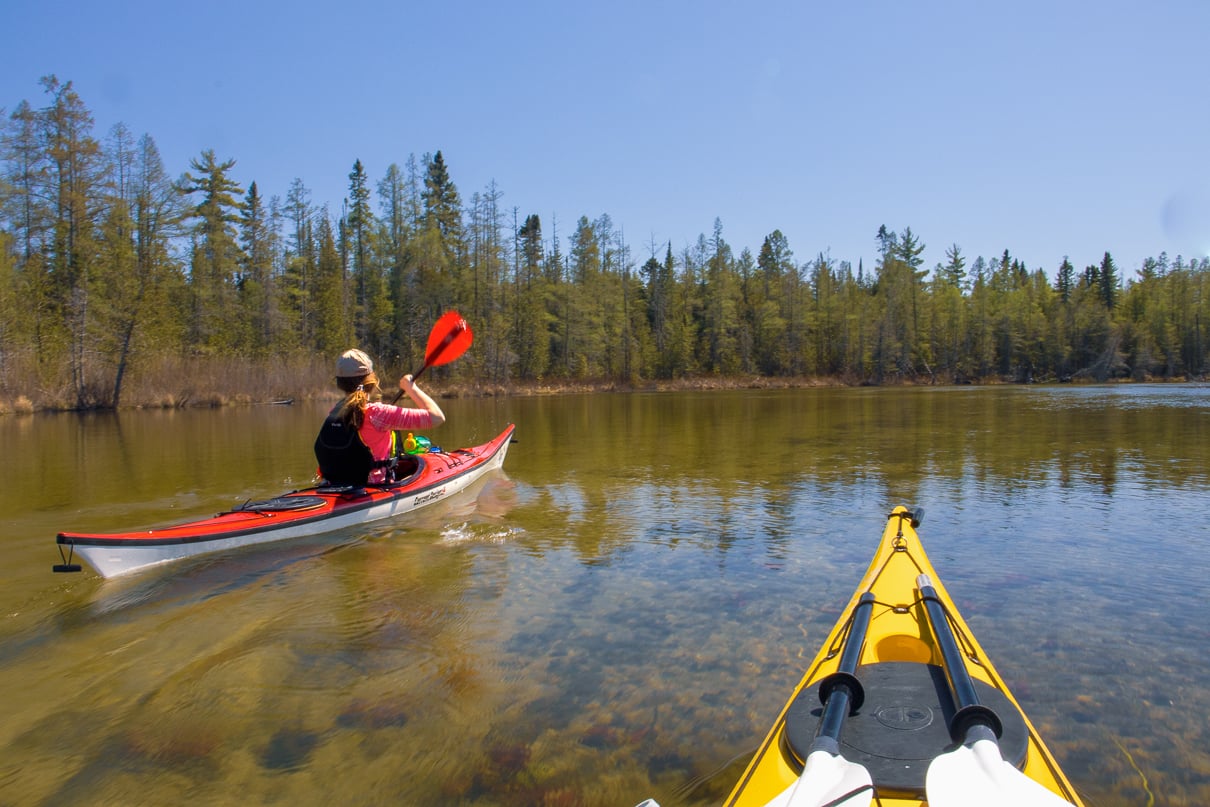 kayaking over the Grass River in Michigan